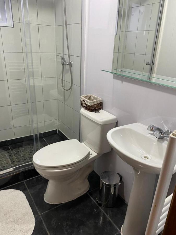 Hostal America En Пуерто Наталес Екстериор снимка