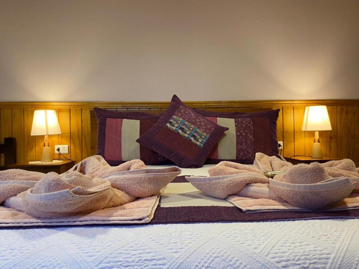Hostal America En Пуерто Наталес Екстериор снимка