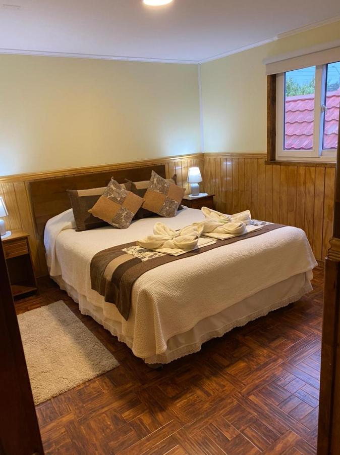 Hostal America En Пуерто Наталес Екстериор снимка