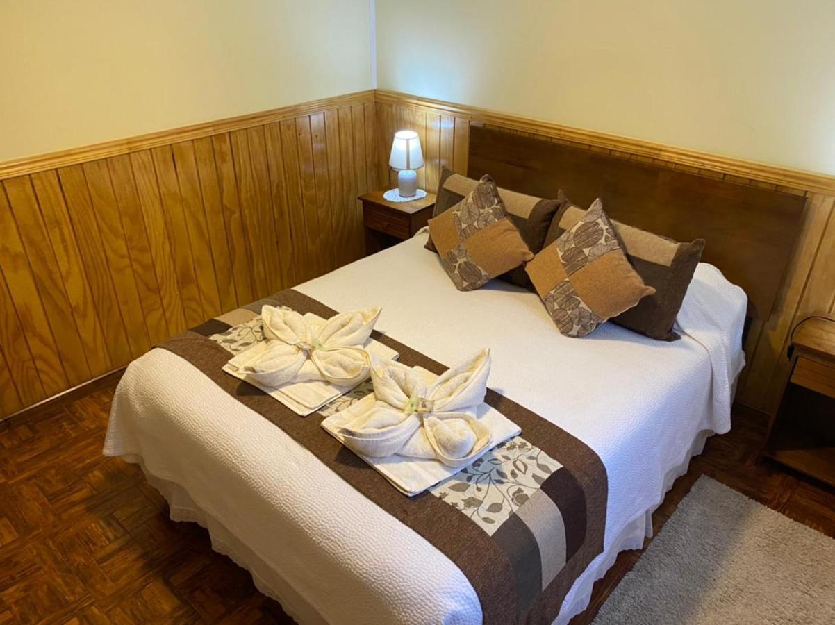 Hostal America En Пуерто Наталес Екстериор снимка
