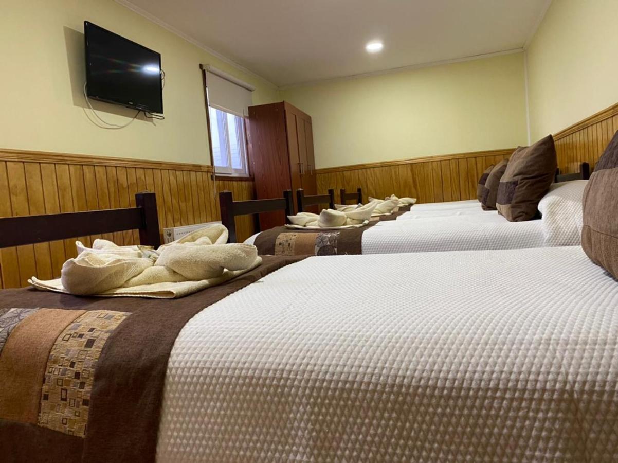 Hostal America En Пуерто Наталес Екстериор снимка