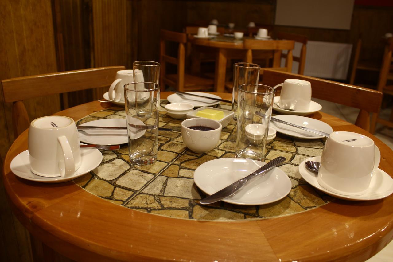 Hostal America En Пуерто Наталес Екстериор снимка