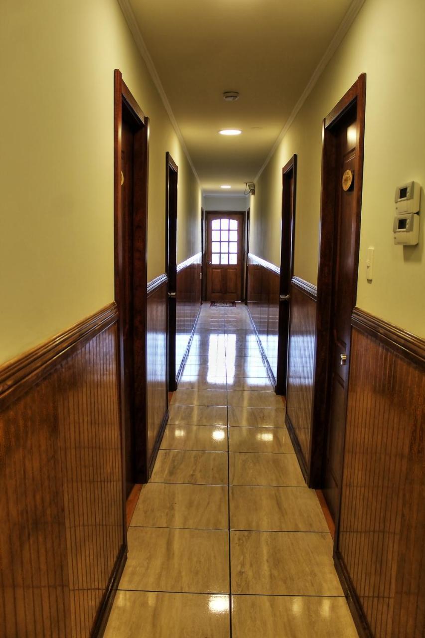 Hostal America En Пуерто Наталес Екстериор снимка